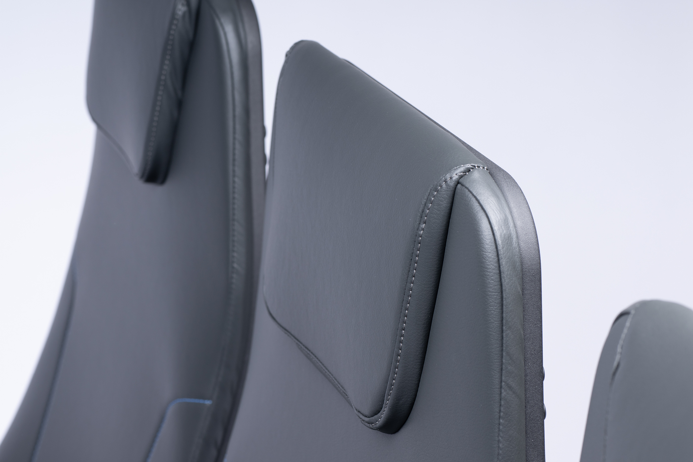 Integrated headrest for kestrel aircraft seat by Mirus aircraft seating
